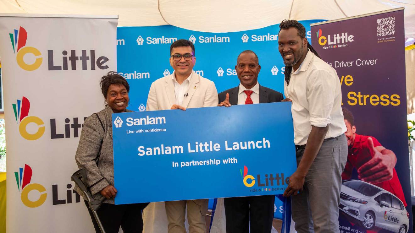 Little Cab driver Beatrice Mangure with Niladri Roy, Chief Operations Officer Little App, Dr. Patrick Tumbo Group CEO Sanlam Kenya PLC and fellow Little driver Nique Baraka at the partnership signing. PHOTO/COURTESY